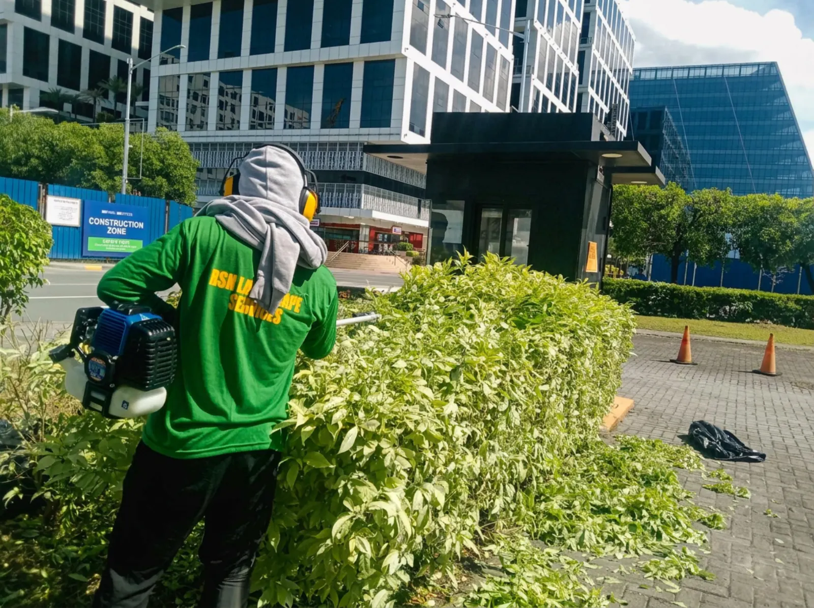 RSN crew maintaining hedges at a commercial property