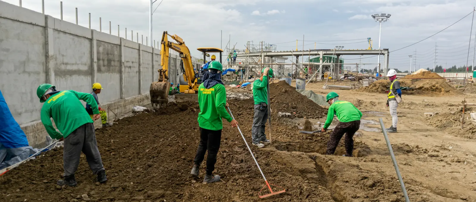 RSN crew preparing and grading soil at a commercial property